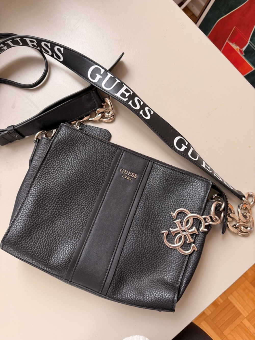 GUESS Black Pebbled Leather Crossbody with Logo Strap and Charm